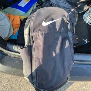 Black Nike backpack with multiple pockets